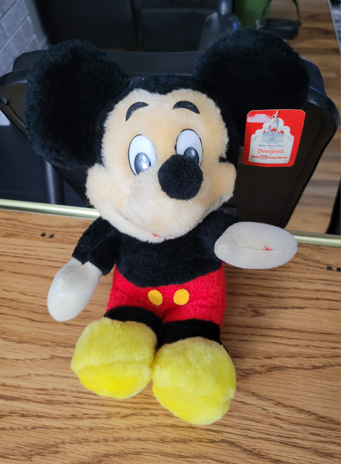 Vintage 1984 Mickey Mouse Disneyland plush toy with tag.