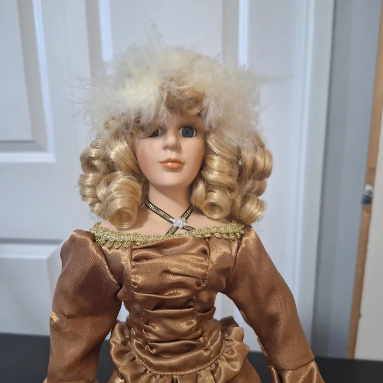 Porcelain Doll with Gold Dress thumbnail
