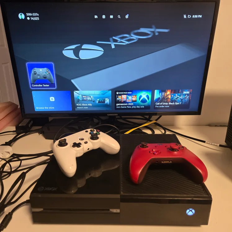 Xbox One digital console with cables and controllers. thumbnail