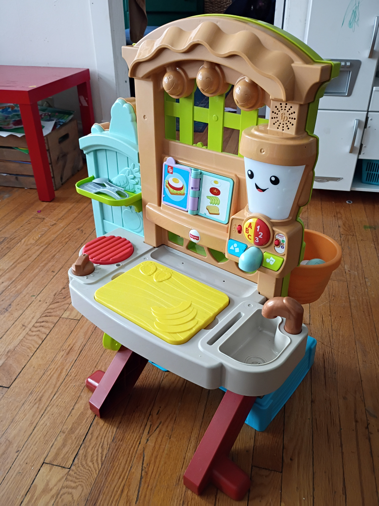 Fisher-Price Grow-the-fun Garden to Kitchen. 10 bucks.