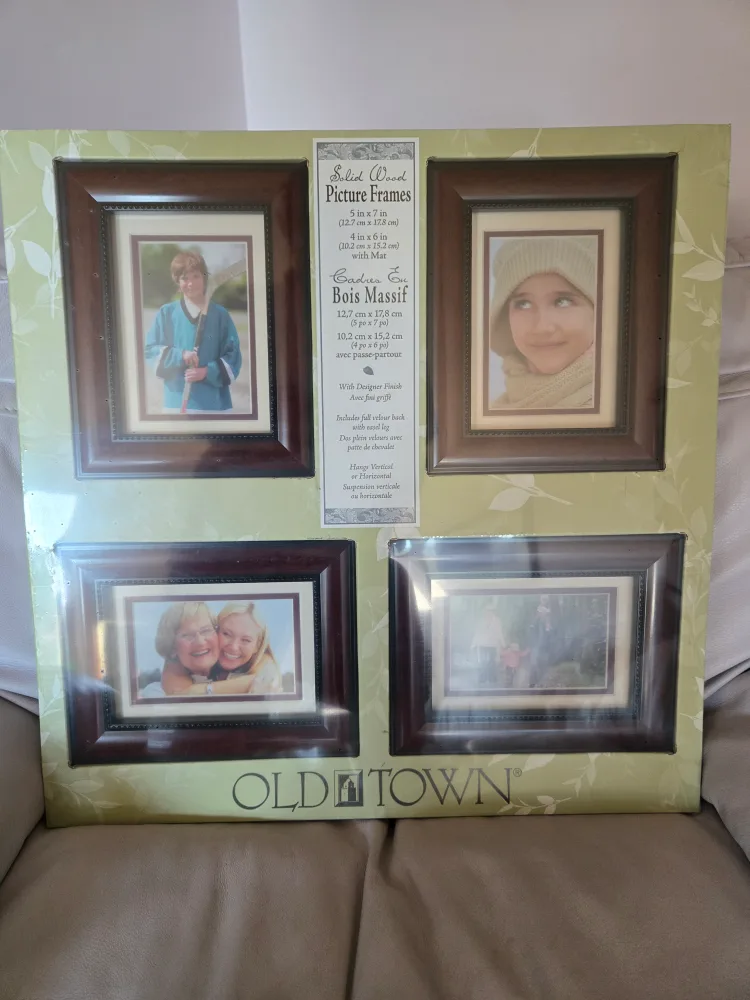 In original packaging. 8 Solid Wood, Beveled, Picture Frames. image indicator(3)