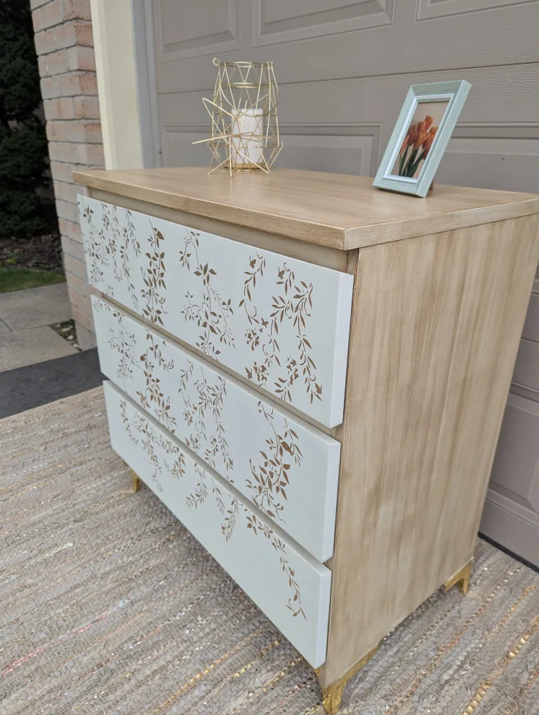 Newly refinished three drawer dresser with floral detail image indicator(3)