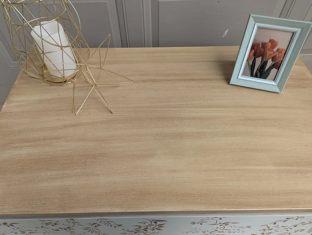 Newly refinished three drawer dresser with floral detail image indicator(6)