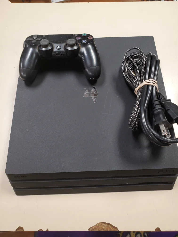 Sony PlayStation 4 Pro Console with Controller thumbnail