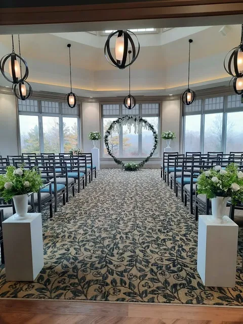 white wedding plinths/pedestal stands& faux floral arrangements image indicator(7)