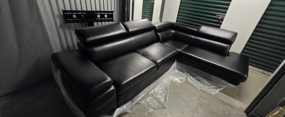 Black leather sectional sofa w Pullout Bed