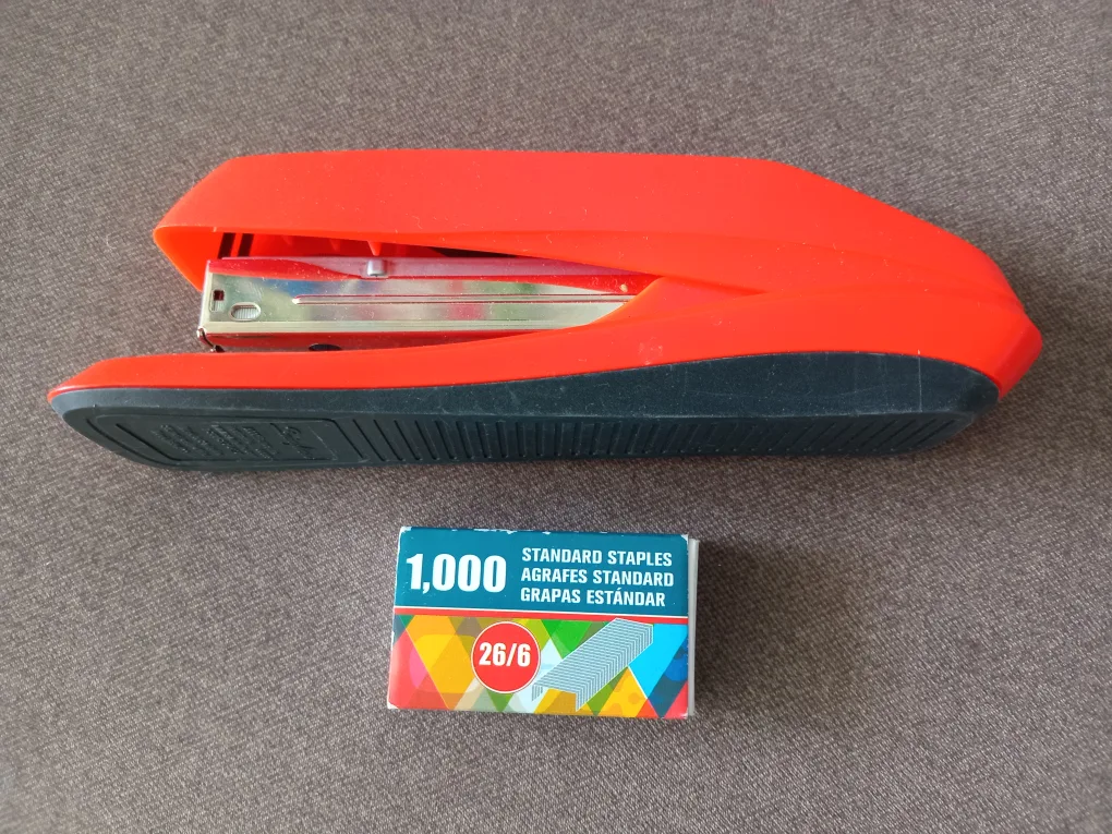 Red Stapler with Staples thumbnail