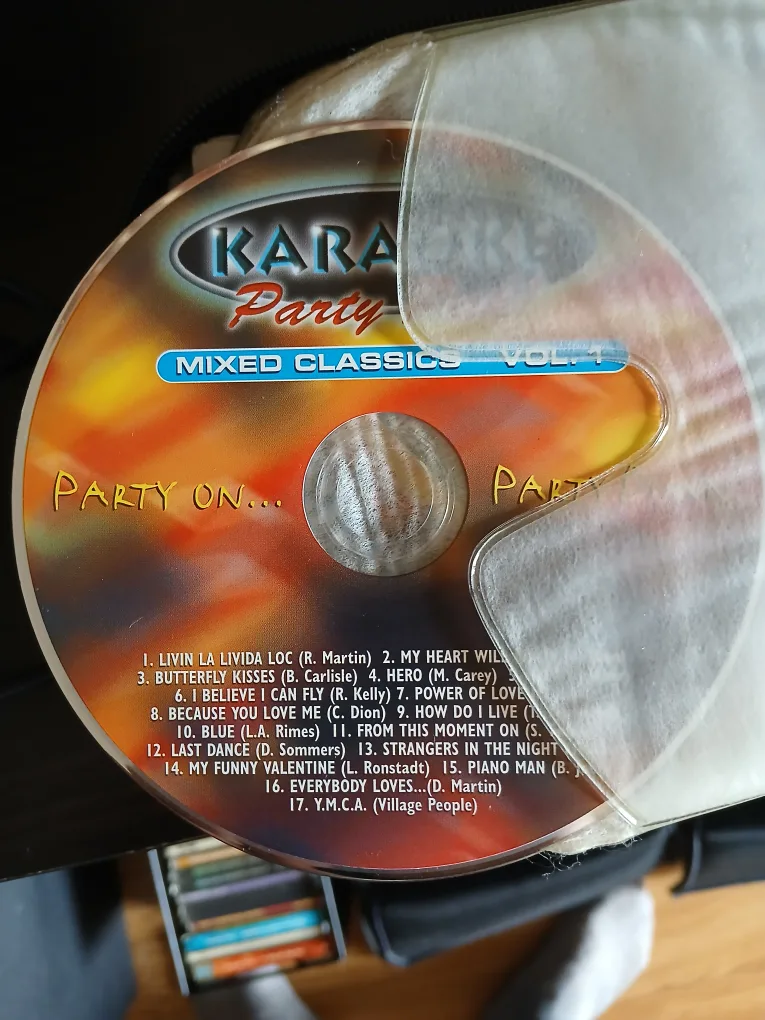 Large Karaoke CD Collection with Free Mic image indicator(6)