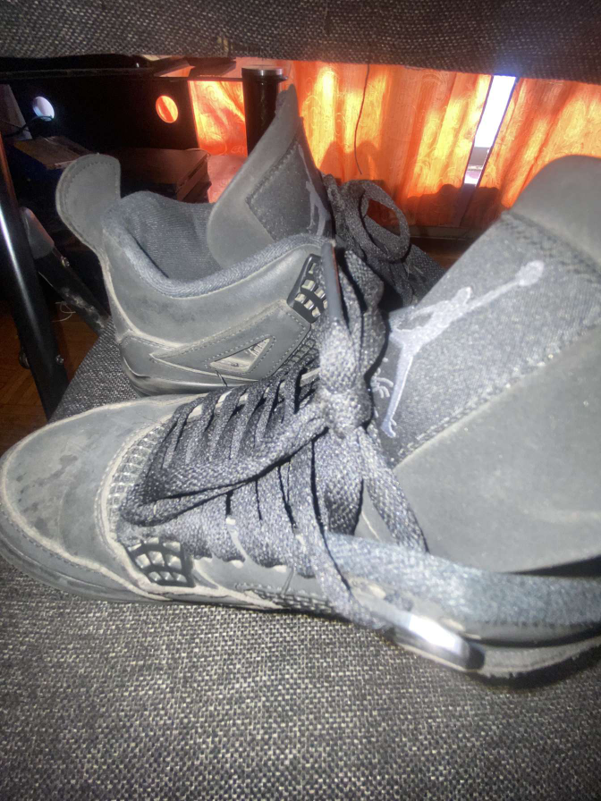 Jordan 4 Retro Black Cat Shoes creased