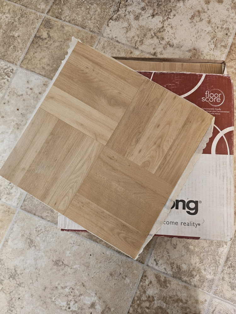 Vinyl peel and stick floor tile