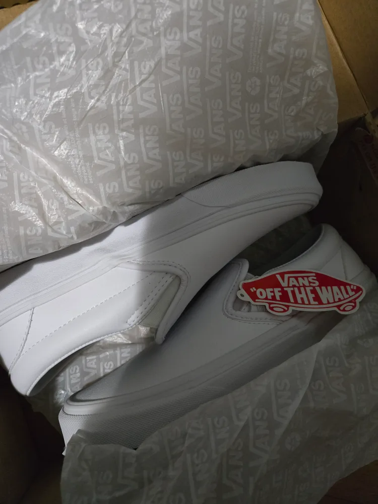 Vans classic slip ons all white leather thumbnail