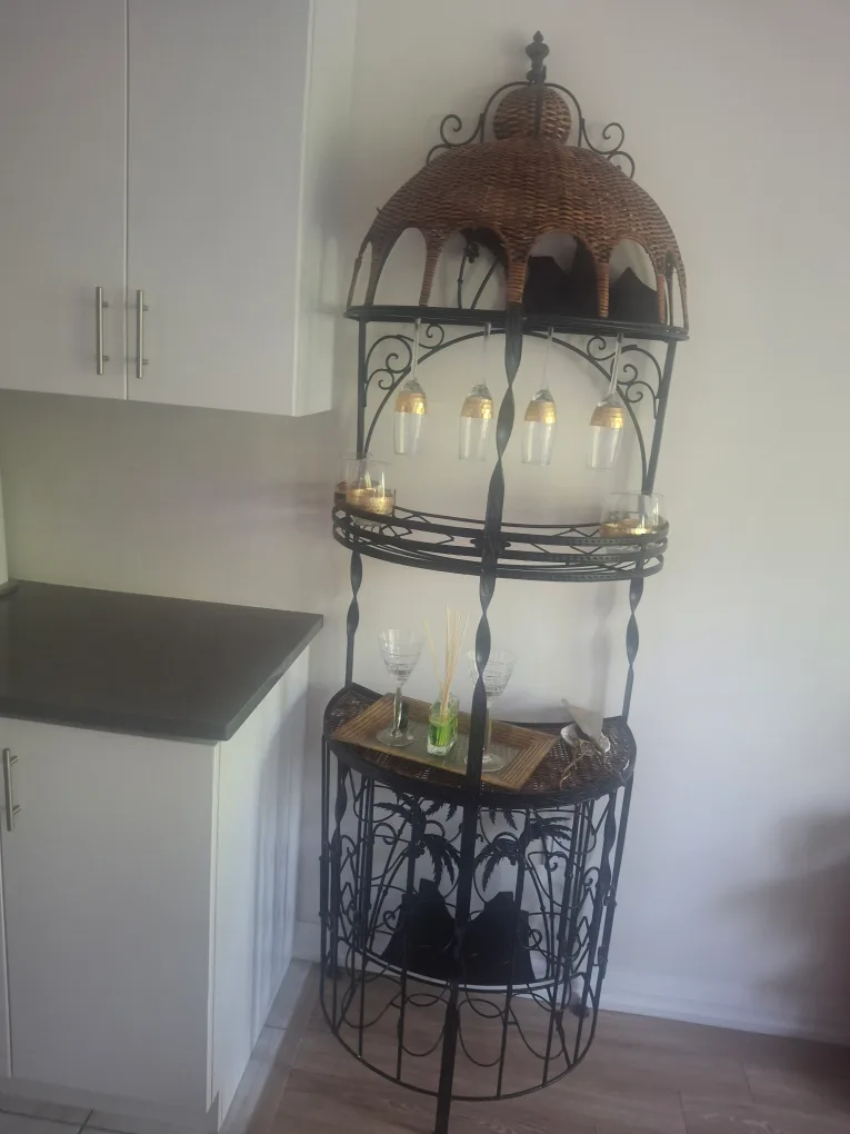 Wicker and Metal  tall vintage wine rack thumbnail