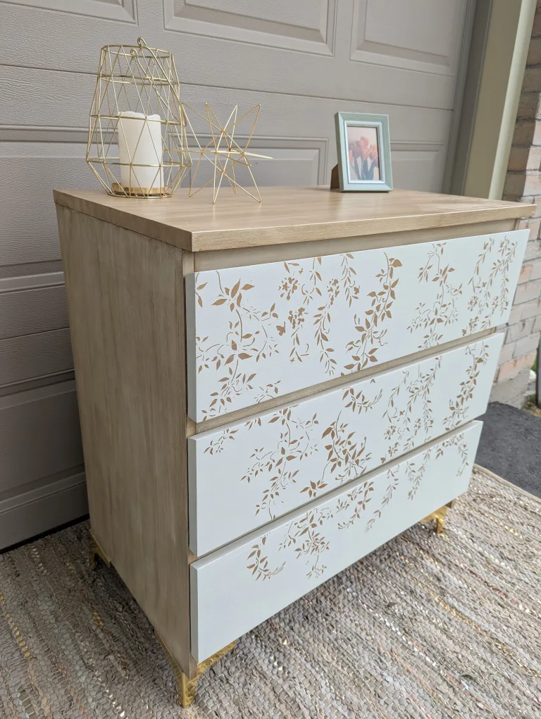 Newly refinished three drawer dresser with floral detail image indicator(4)
