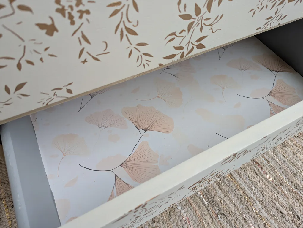 Newly refinished three drawer dresser with floral detail image indicator(7)