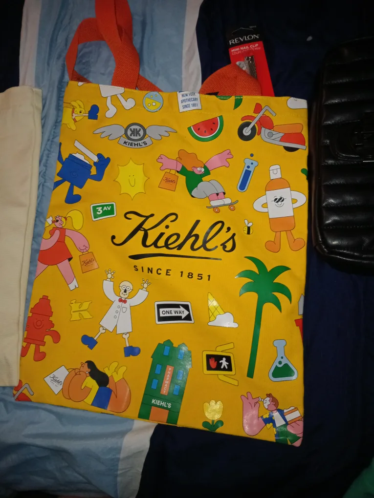 Kiehl's Yellow Tote Bag and random mens shirts thumbnail