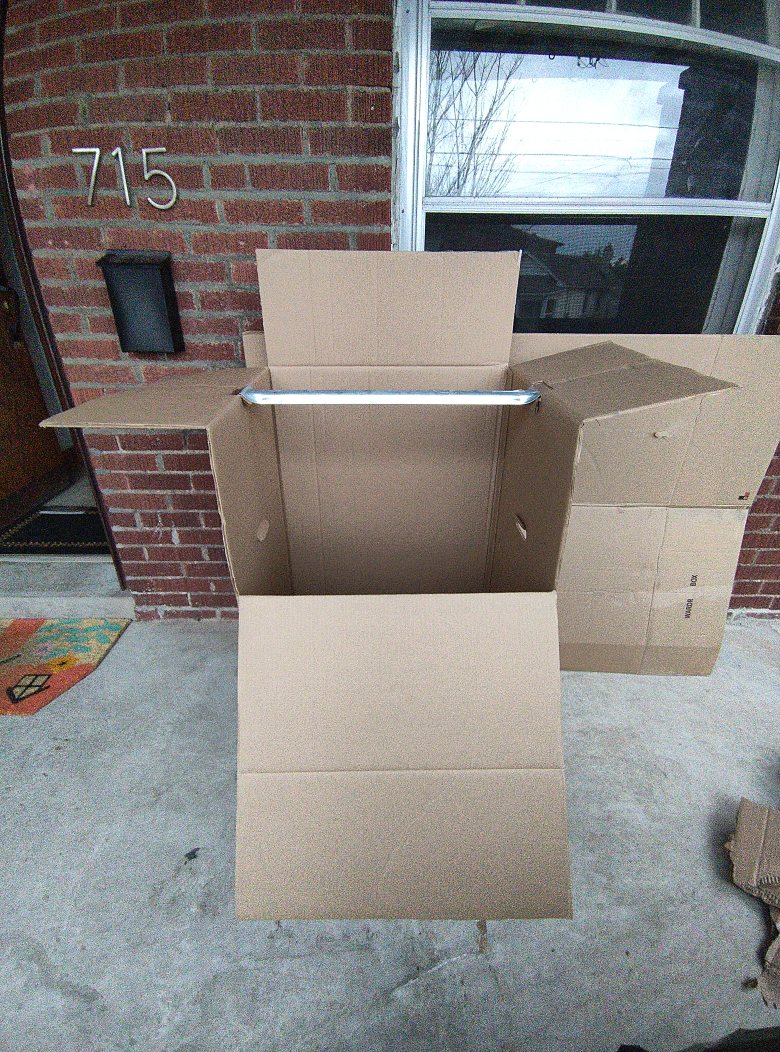 Four large moving boxes for hanging clothes