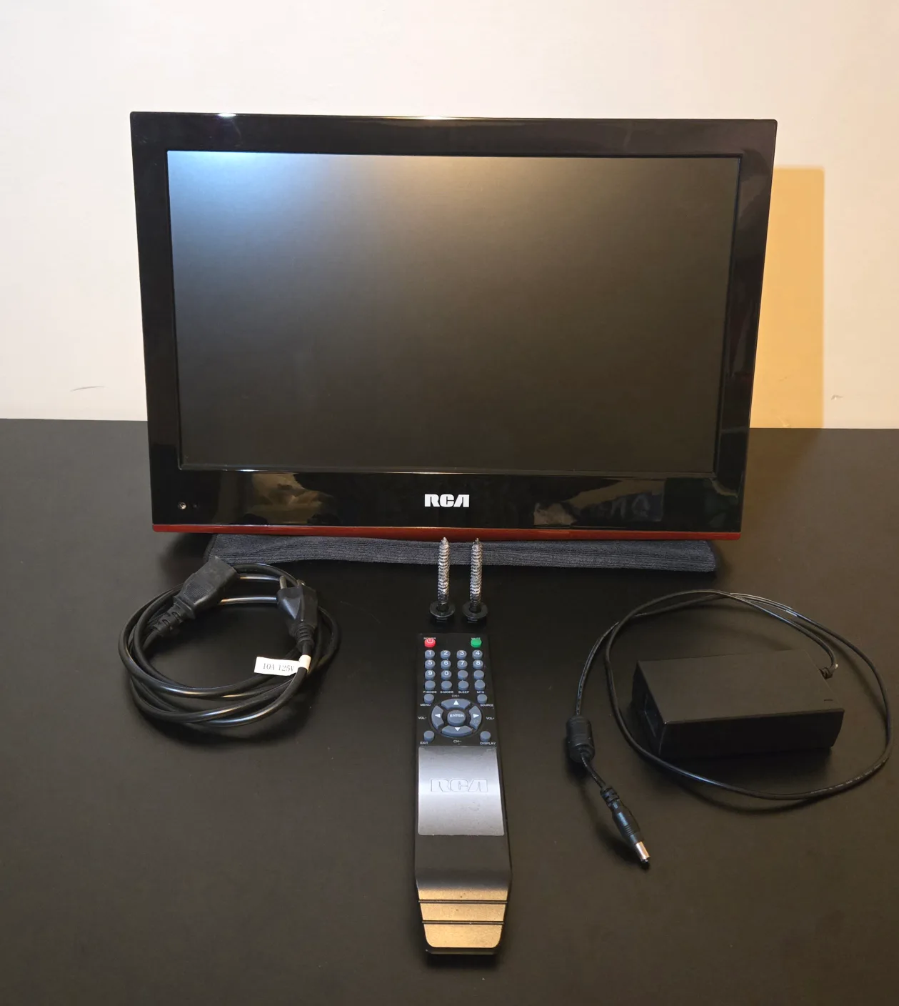 RCA 21" Wall-Mount TV + Remote + Power Adapter thumbnail
