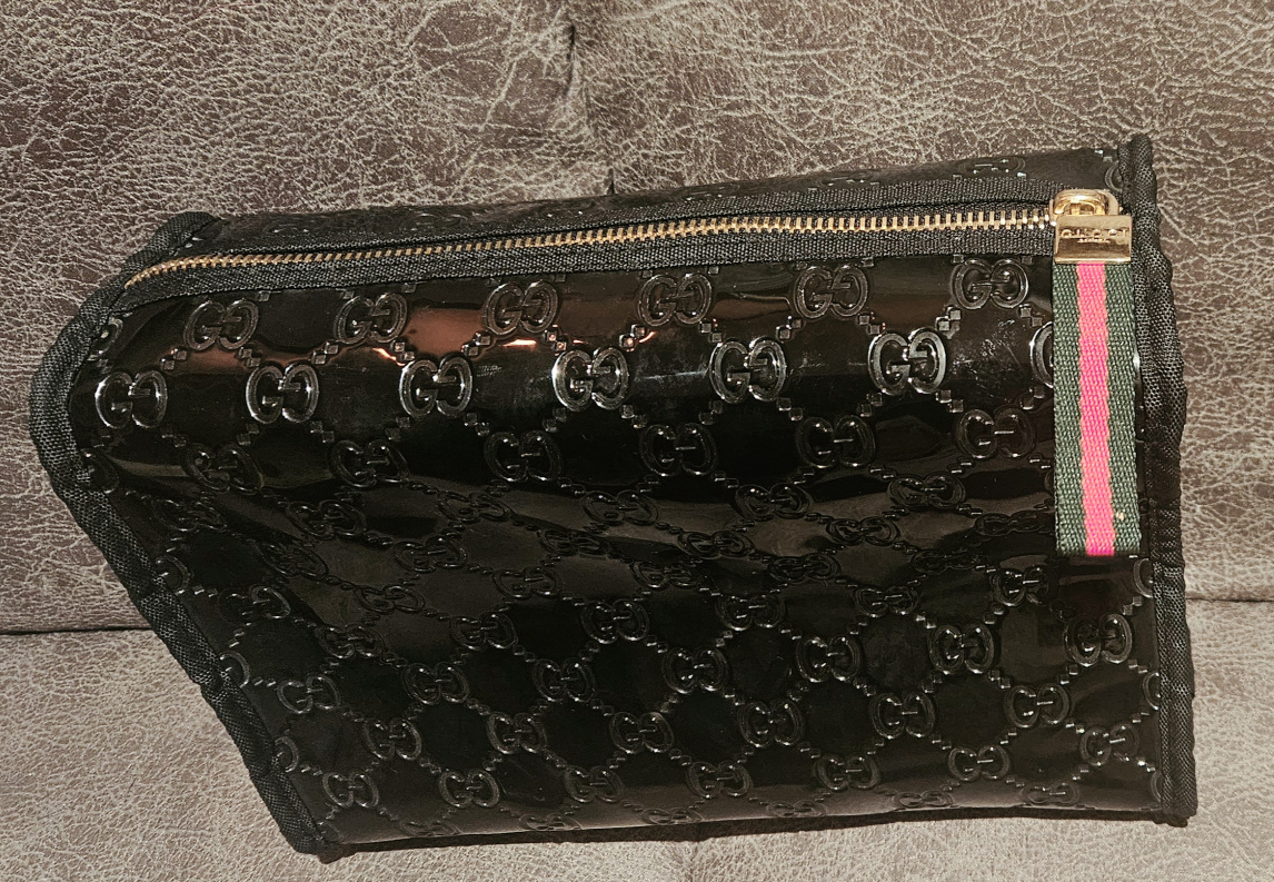 Gucci Monogrammed makeup pouch