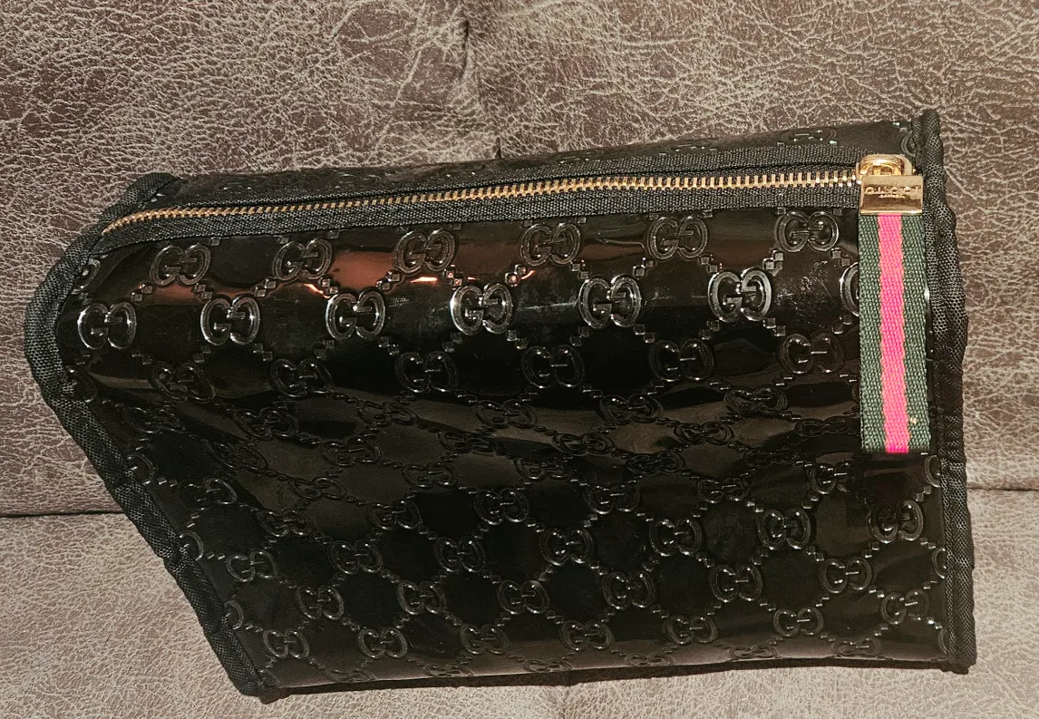 Gucci Monogrammed makeup pouch thumbnail