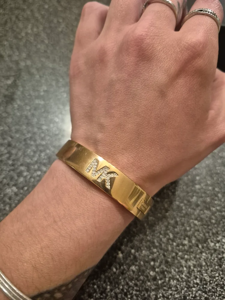 Michael Kors Gold Bangle Bracelet with MK Logo image indicator(3)