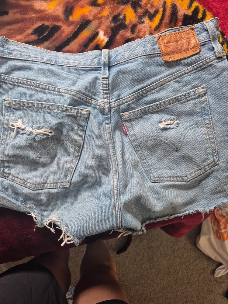 Levi's 501 Ripped Denim Shorts - Size 28 thumbnail