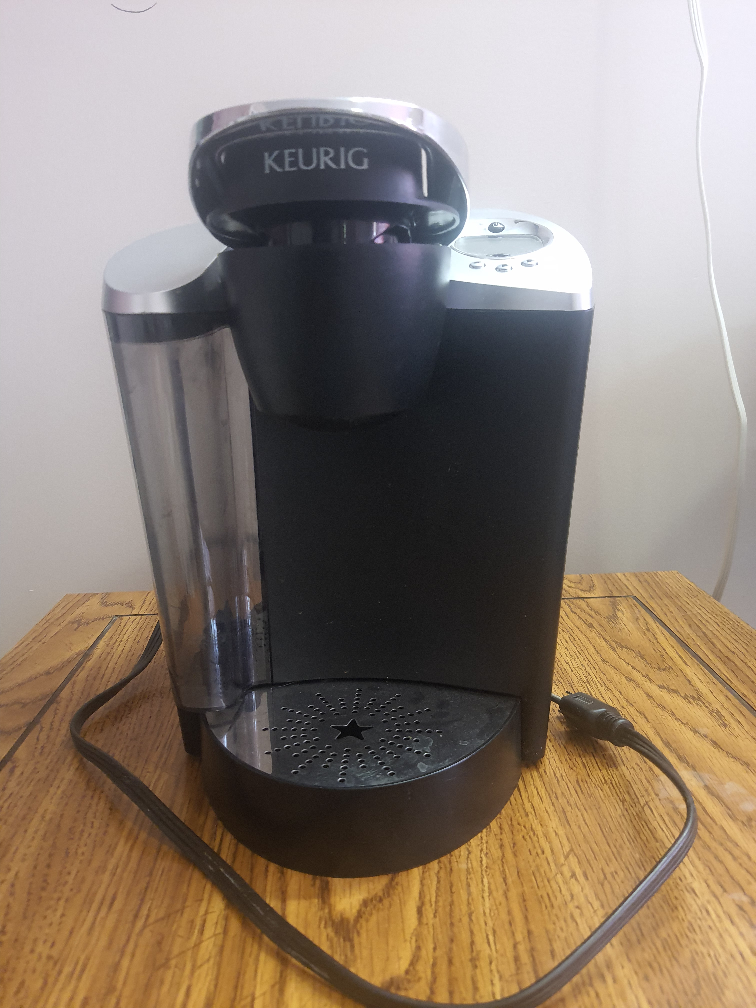 Keurig Coffee Maker - Black, has reusable filler .