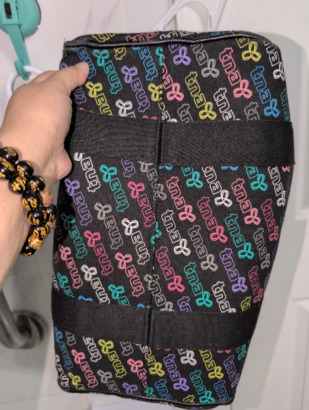 TNA black and colourful logo print bag image indicator(3)