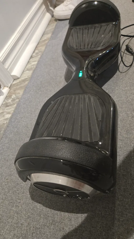 Black Hoverboard with Charger (works) image indicator(2)