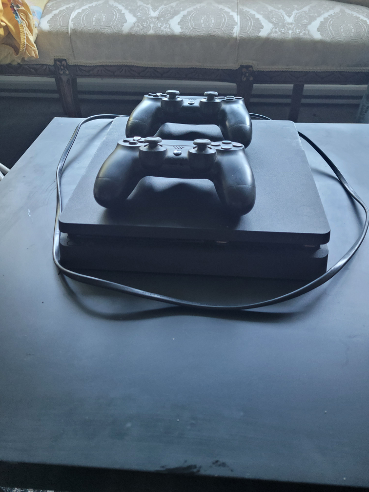 PlayStation 4 with 2 Controllers