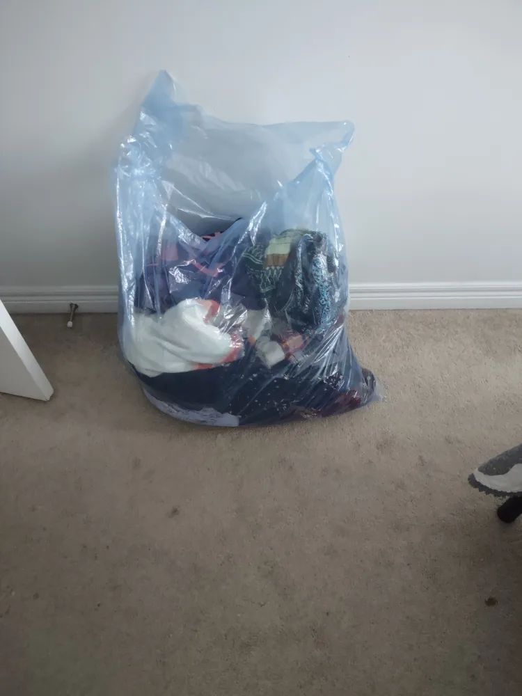 bag of women's clothes thumbnail