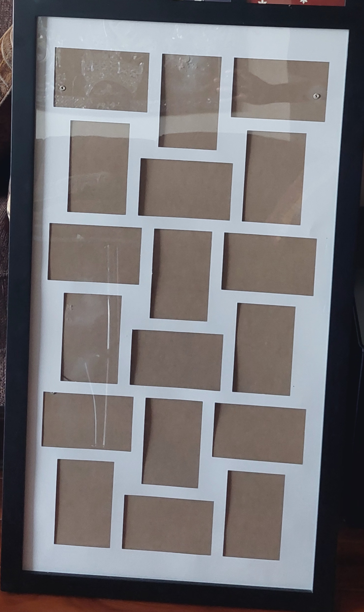 2 - Black frame with multiple slots for photos of $ 15 each. - photo 2