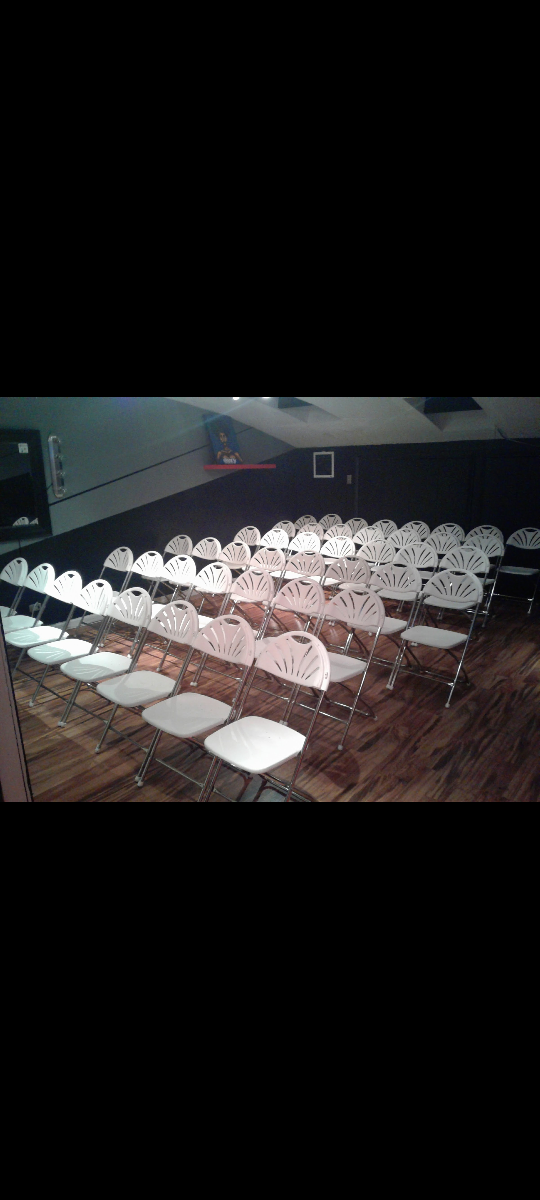 45 White plastic & metal fan back folding chairs