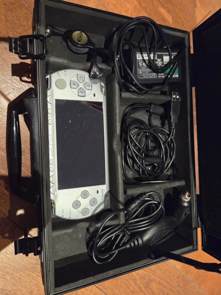 Sony PlayStation Portable (PSP) with Games & Accessories thumbnail