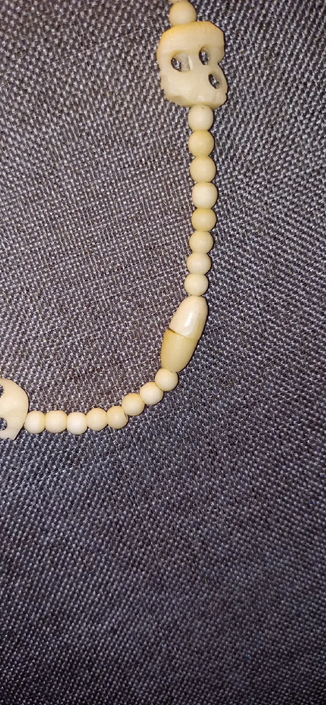 Vintage Elephant Bone Necklace with detailed chain pieces image indicator(3)