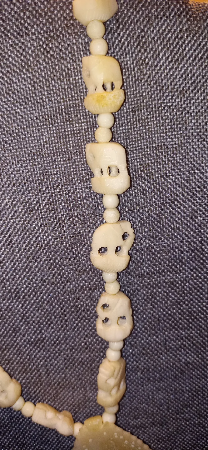 Vintage Elephant Bone Necklace with detailed chain pieces image indicator(4)