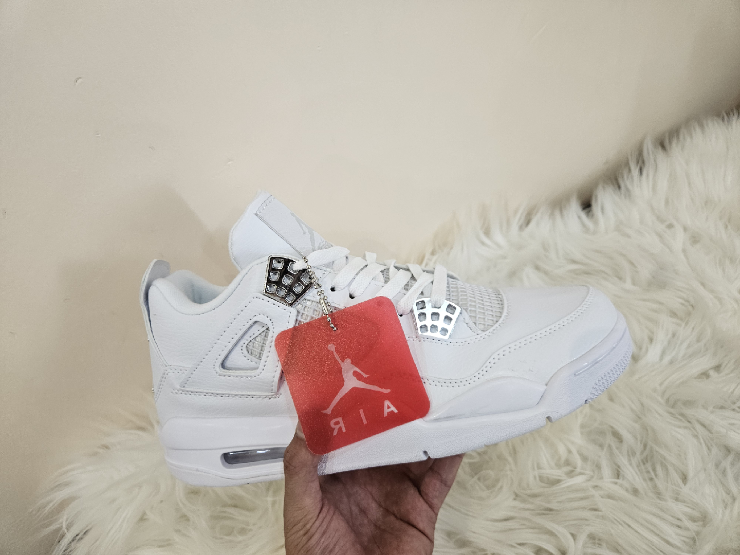 Jordan 4s Pure Moneys