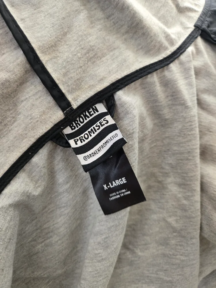 Broken Promises raincoat image indicator(4)