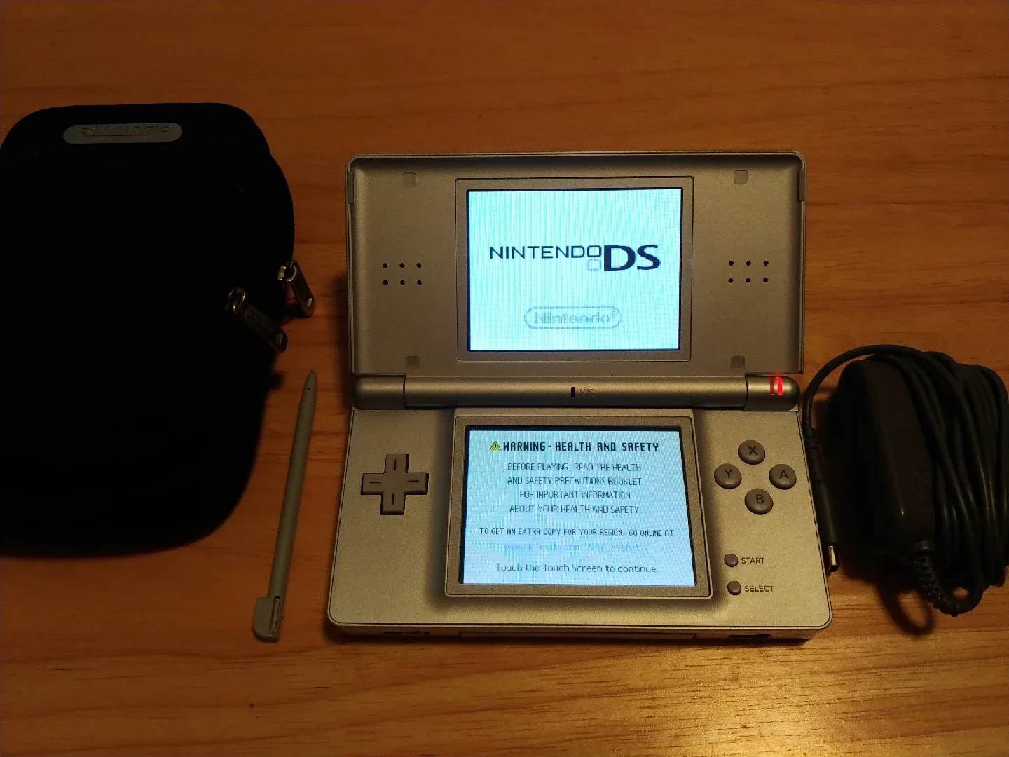 Nintendo DS Lite with Games, Charger & Case image indicator(3)