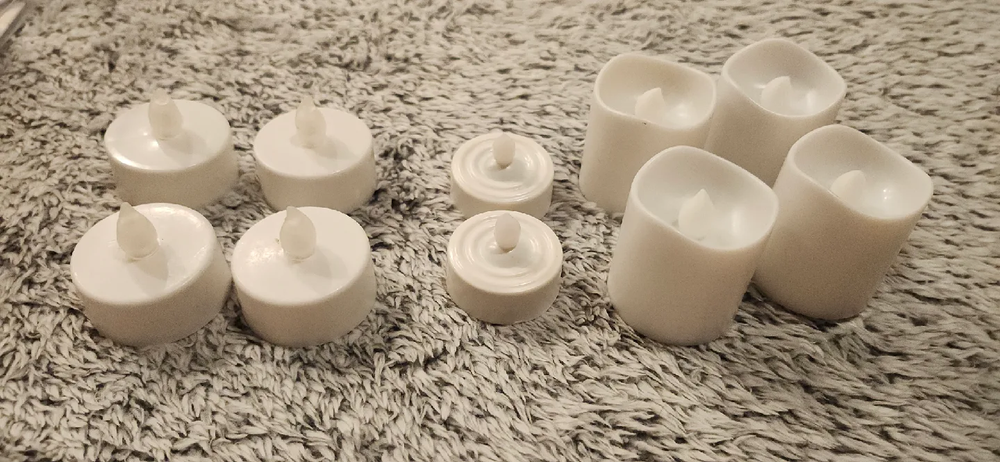 Flameless T-light and small pillar candles. (16 count) image indicator(2)