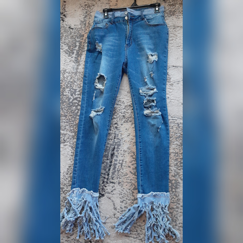 Distressed Jeans with Frayed Hem - photo 3
