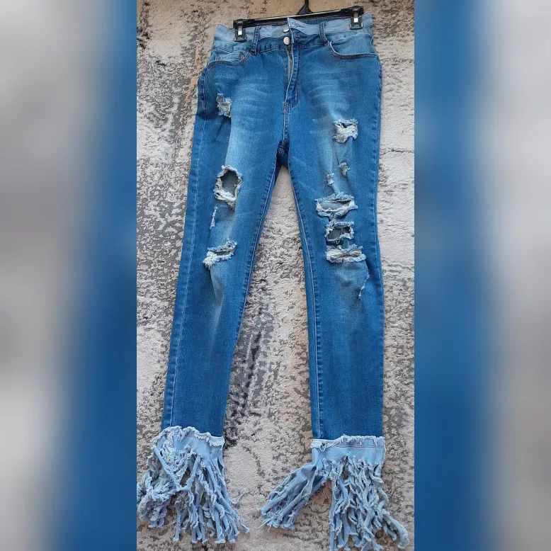 Distressed Jeans with Frayed Hem image indicator(3)