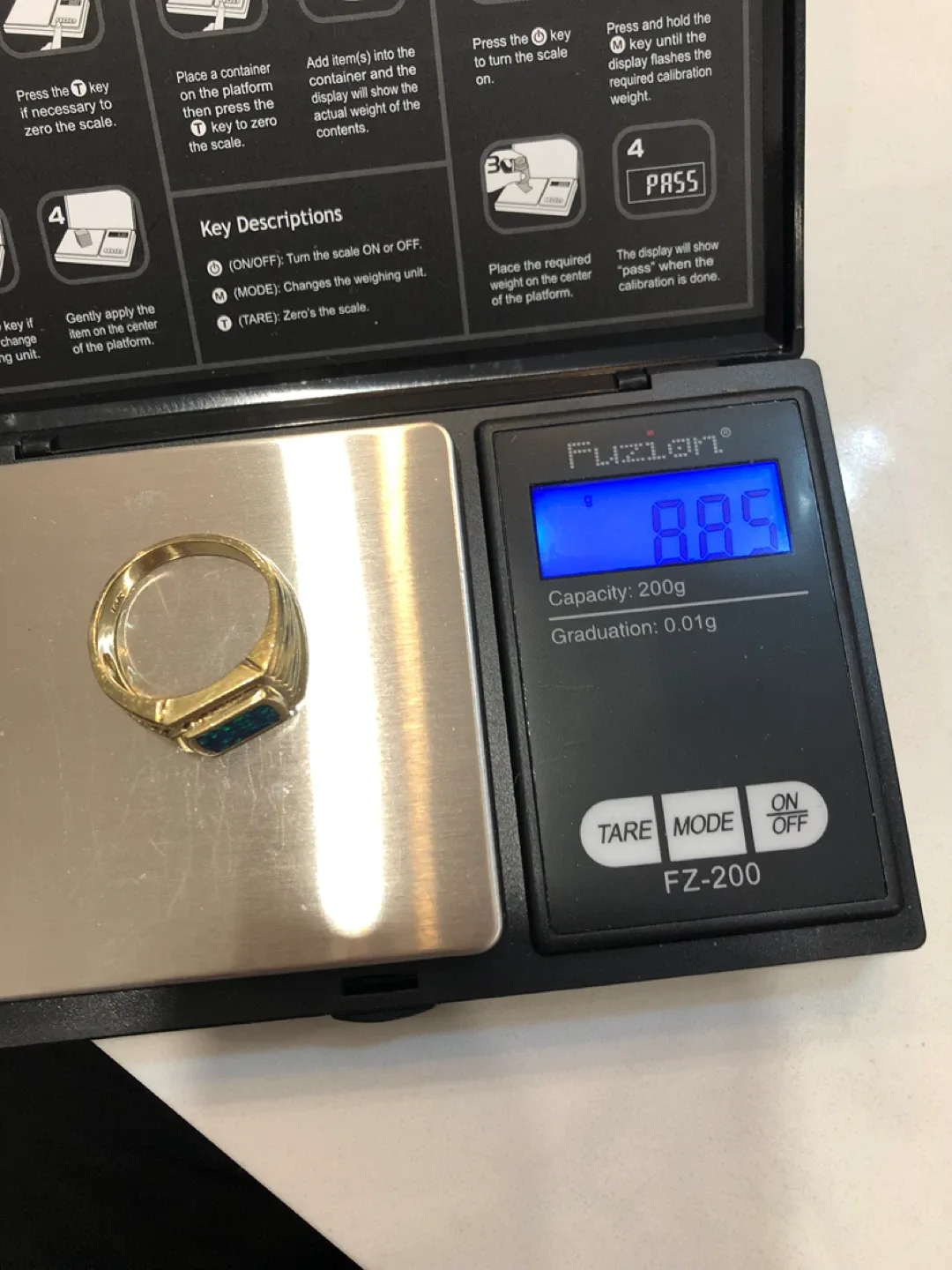 Gold Ring with Blue Sapphire diamonds image indicator(3)