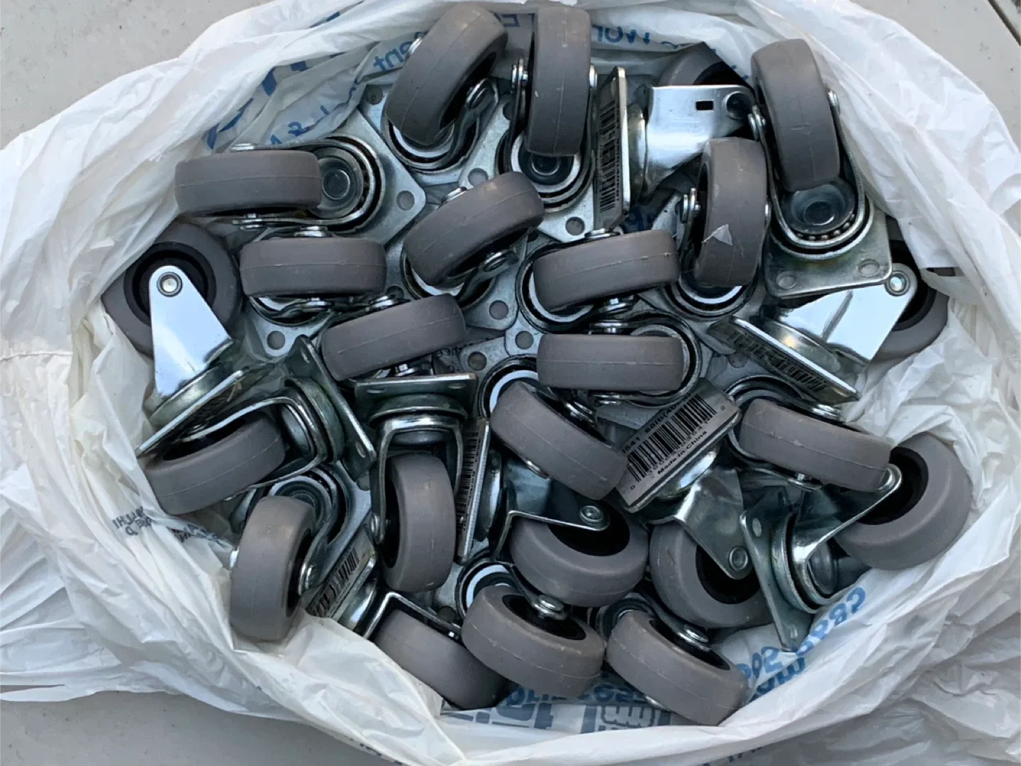Bag of Grey Swivel Casters thumbnail