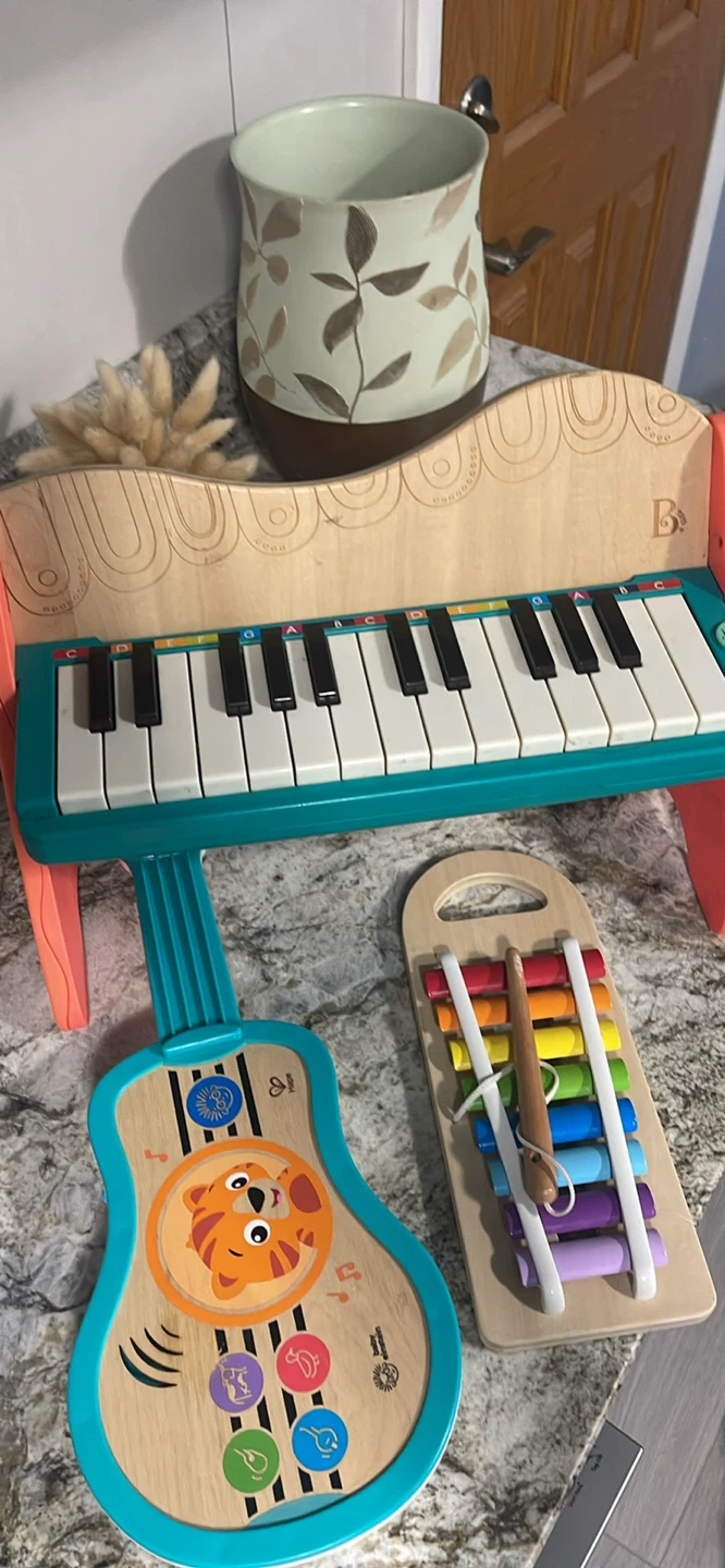 B. Toys Wooden Piano & Hape Baby Einstein Guitar