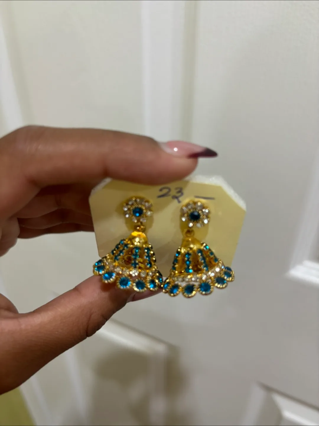 Blue & Gold Jhumka Earrings image indicator(3)