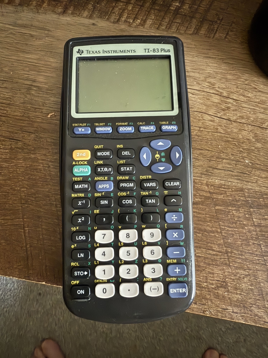 Ti 83 plus graphing calculator.