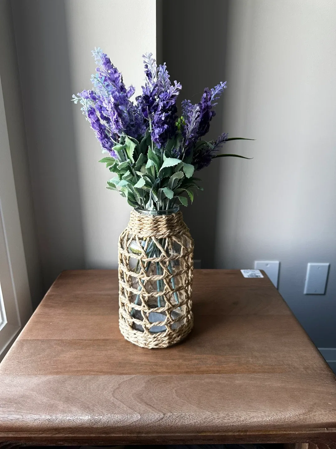 Lavender Floral Arrangement in Woven Vase thumbnail