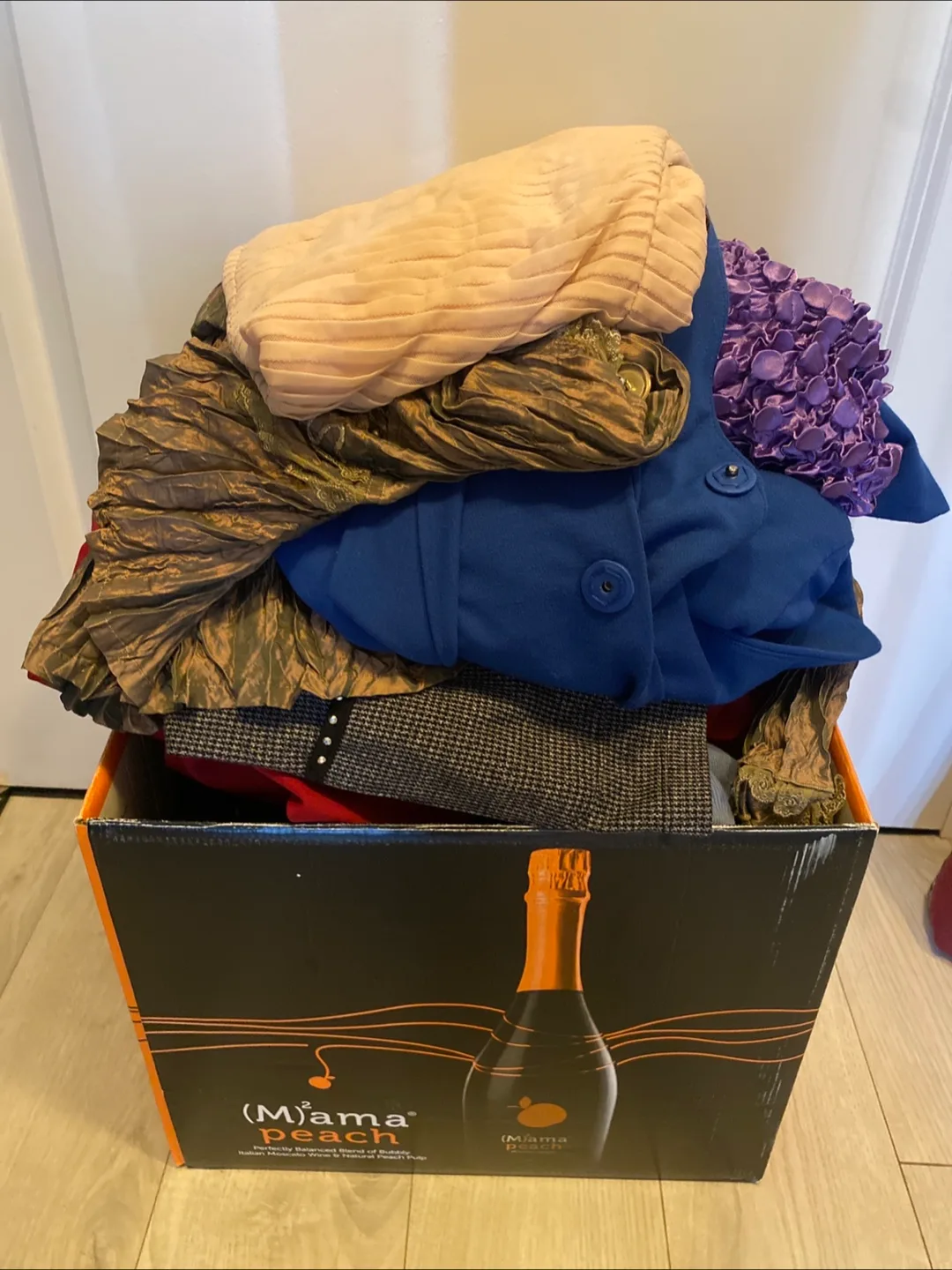 Box of assorted clothing thumbnail
