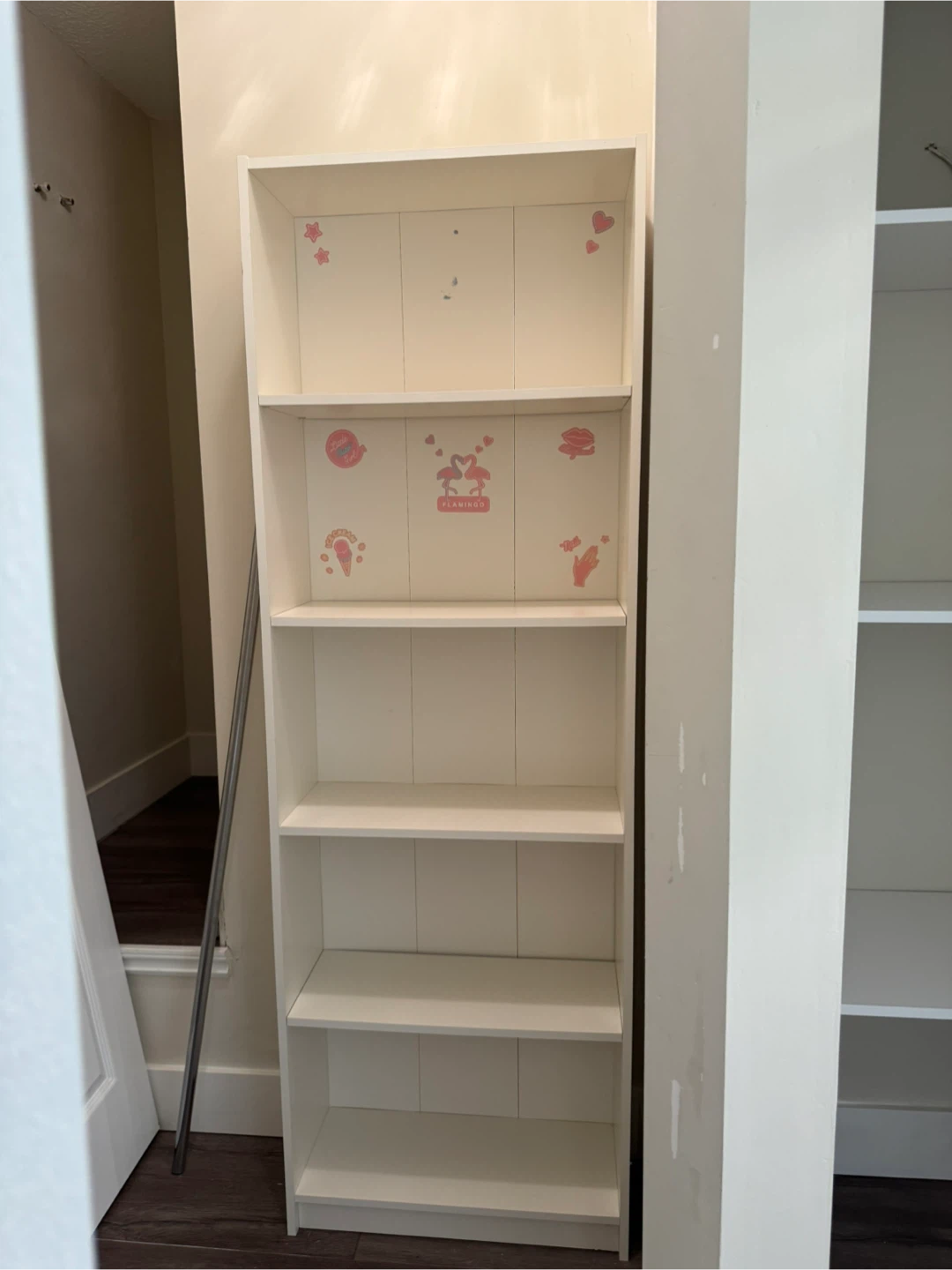 White Bookcase with Pink Flamingo Design