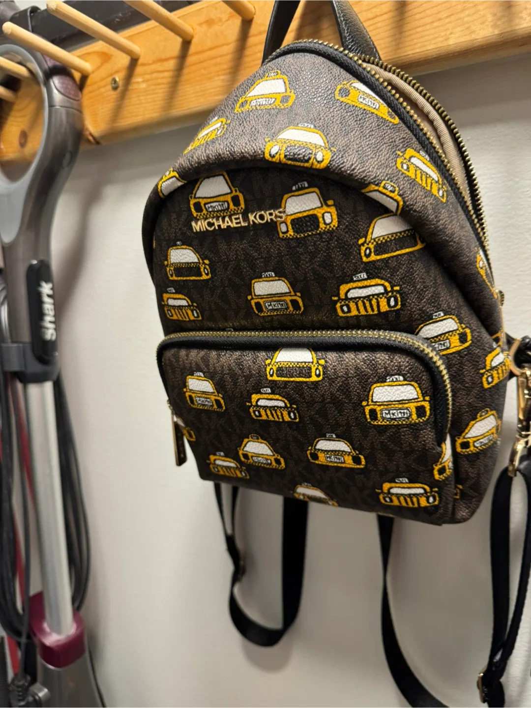Michael Kors Taxi Print Wallet and Backpack image indicator(3)